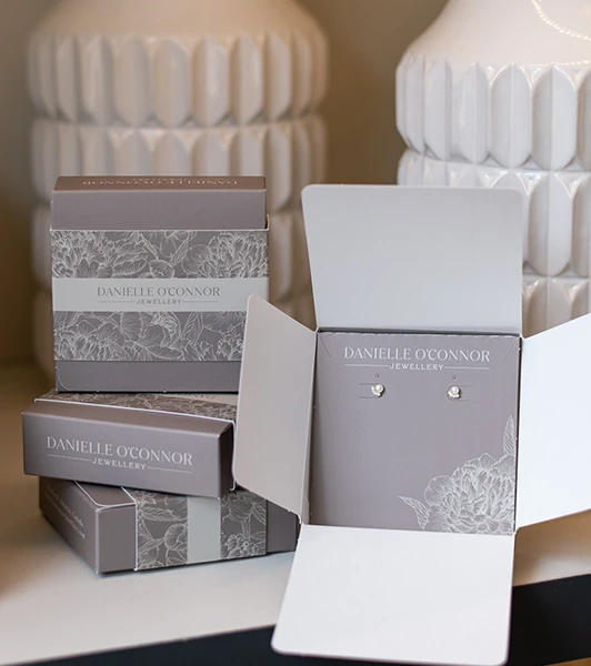 Danielle O'Connor Jewellery packaging, an embodiment of Ingersoll Paper Box's expertise in crafting elegant and sustainable packaging solutions that make a lasting impression.