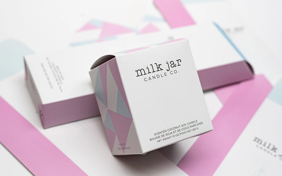 Milk Jar Candle Co. soy candle packaging by Ingersoll Paper Box, a blend of impactful design and functionality that reinforces brand identity and sustainability.